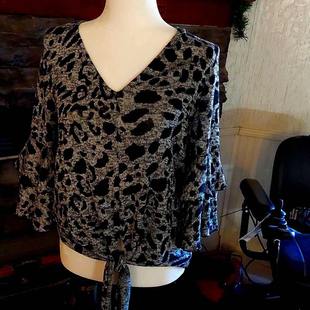 Grey with black spots v-neck  top.
